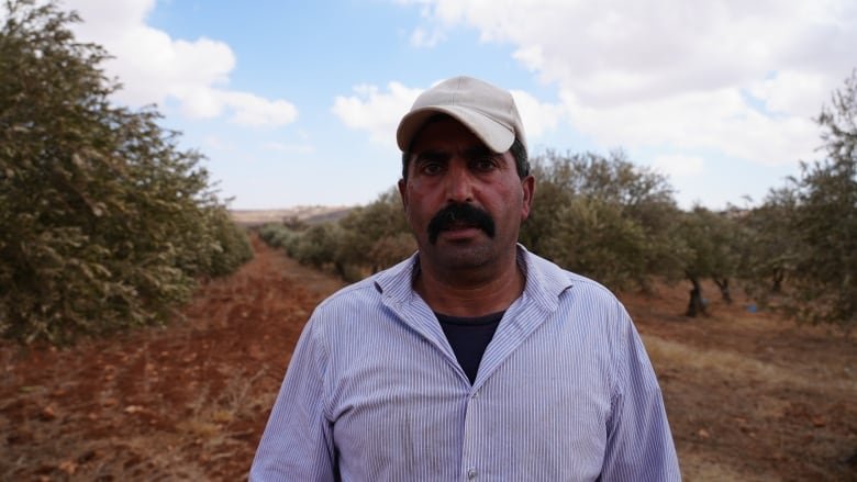 Abdel Kareem Na'ssan told CBC news that he and his family were confronted by Israeli settlers earlier this month after they tried to pick olives. He said they fired guns in their direction and uprooted some of the trees.