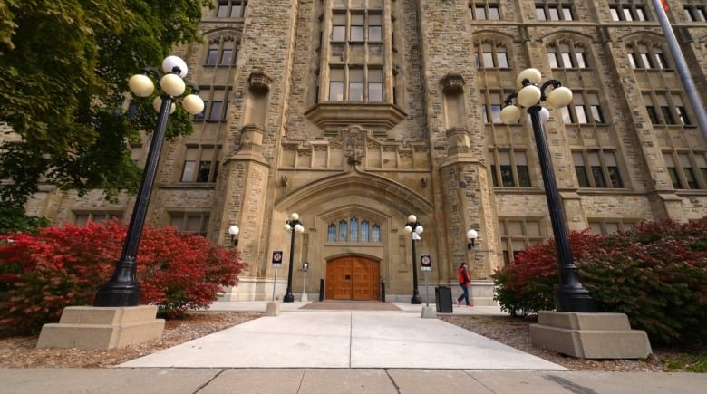 The front of a large stone building.