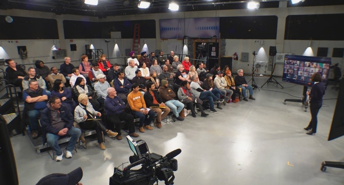 hvac-studio-shoot About wide shot of 40 people gathered in a studio at CBC.