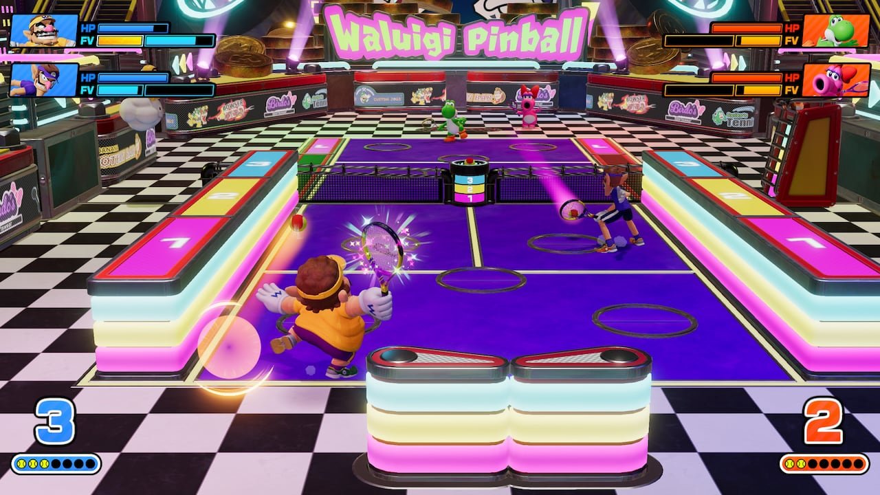 video game screenshot of Mario characters playing tennis on a large pinball table.