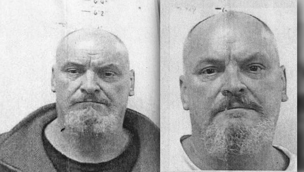 Two black-and-white mugshots of a man.