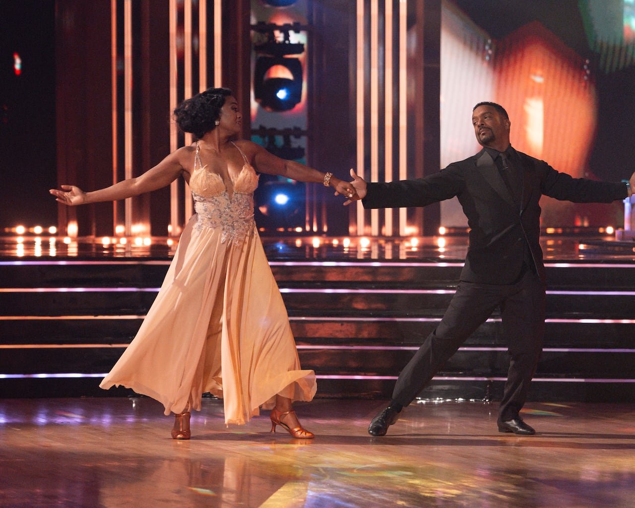 default-1260 man and woman dancing a ballroom routine